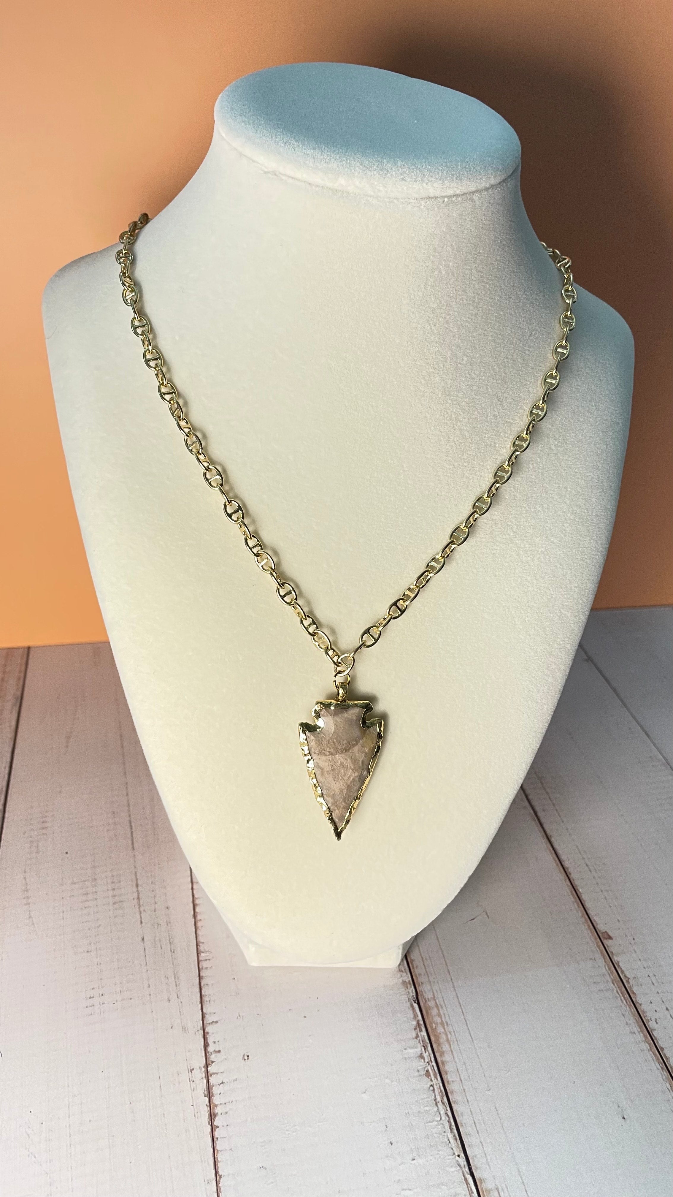 Beige Chert Arrowhead Necklace with Gold Chain on mannequin display bust