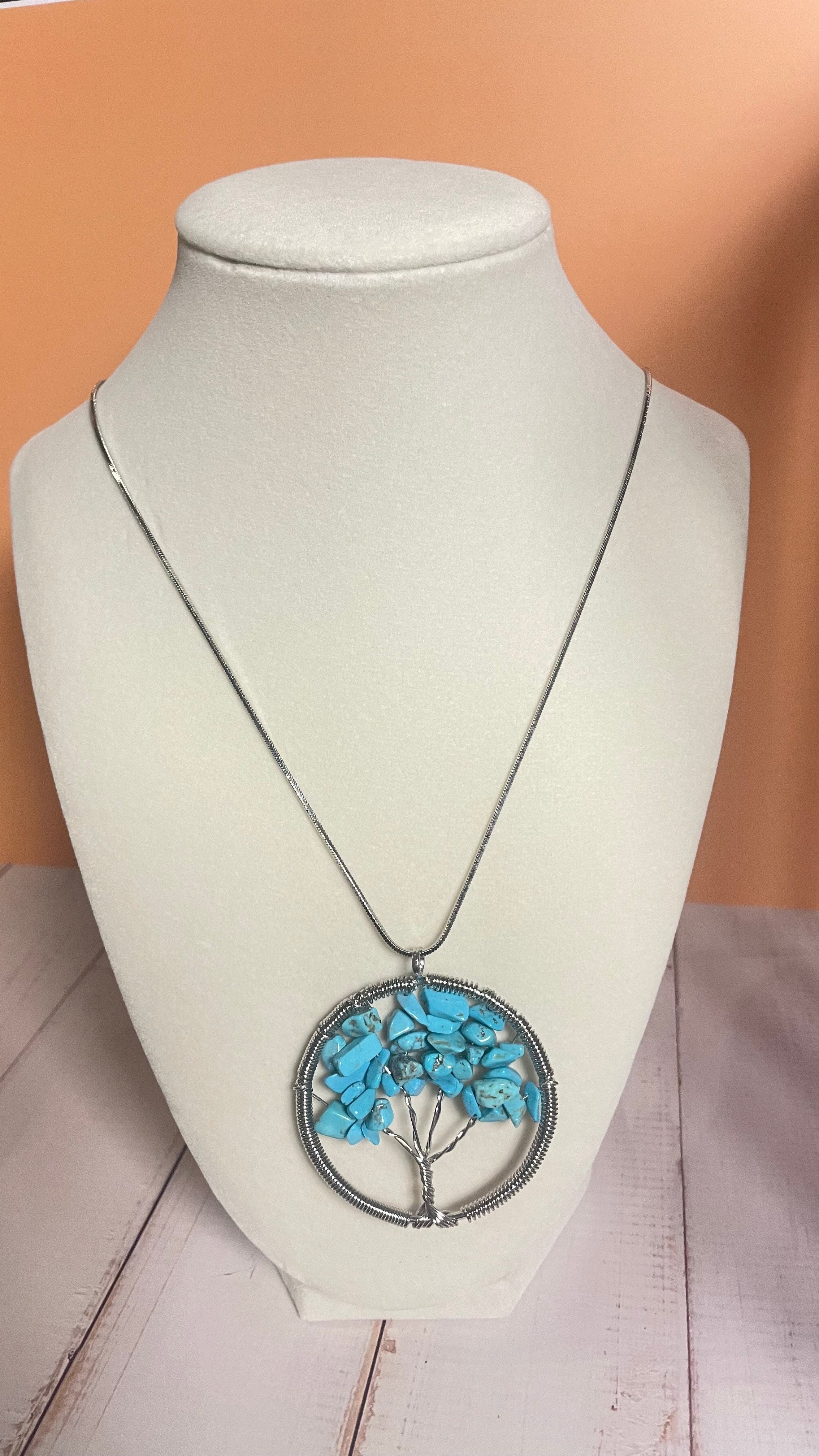 Wagnerite Crystal Chip Tree Pendant Silver Necklace on mannequin display bust